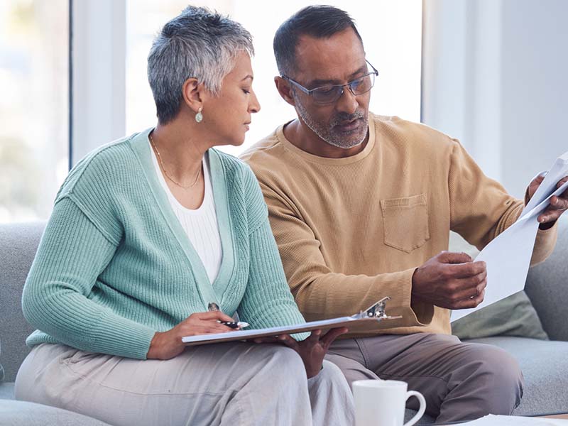 Older couple reviewing plan details